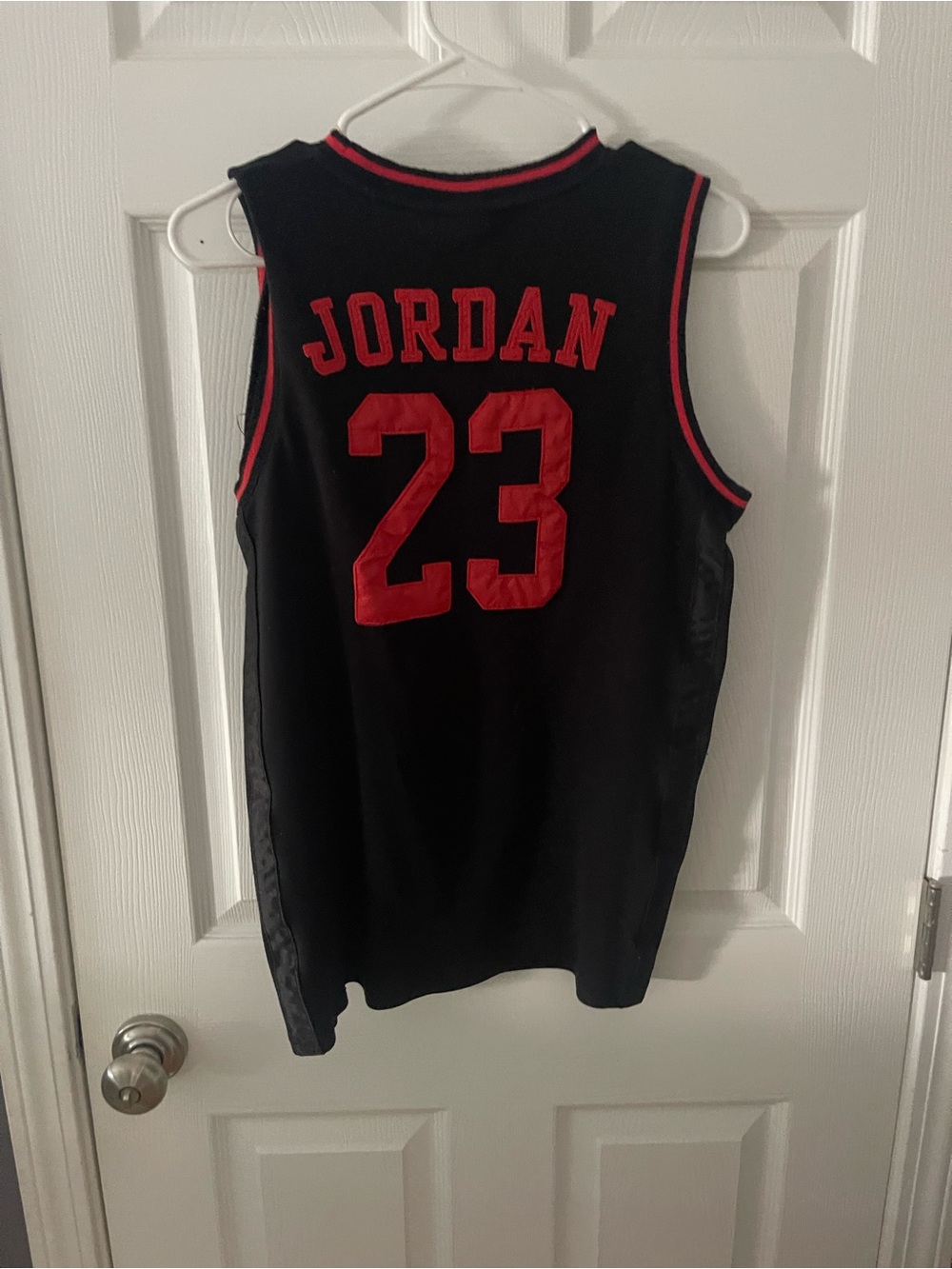 Jordan Black Jersey with Red Trim and Logo